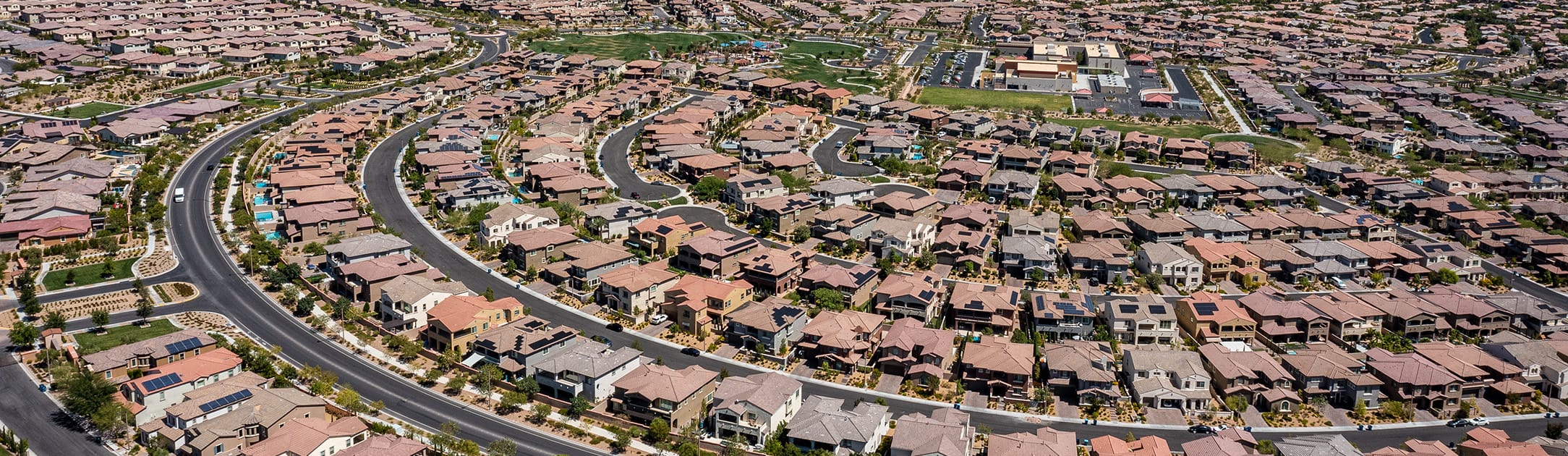 Aerial view of neighborhood with curved streets.