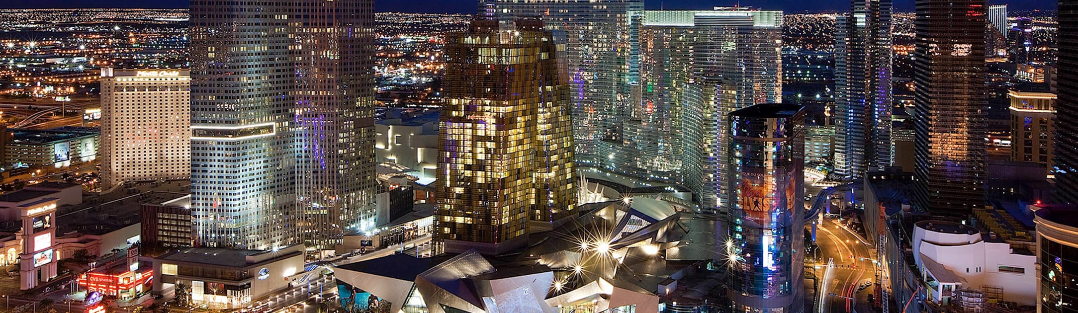 Night views of high rises, talk buildings, casinos and streets.